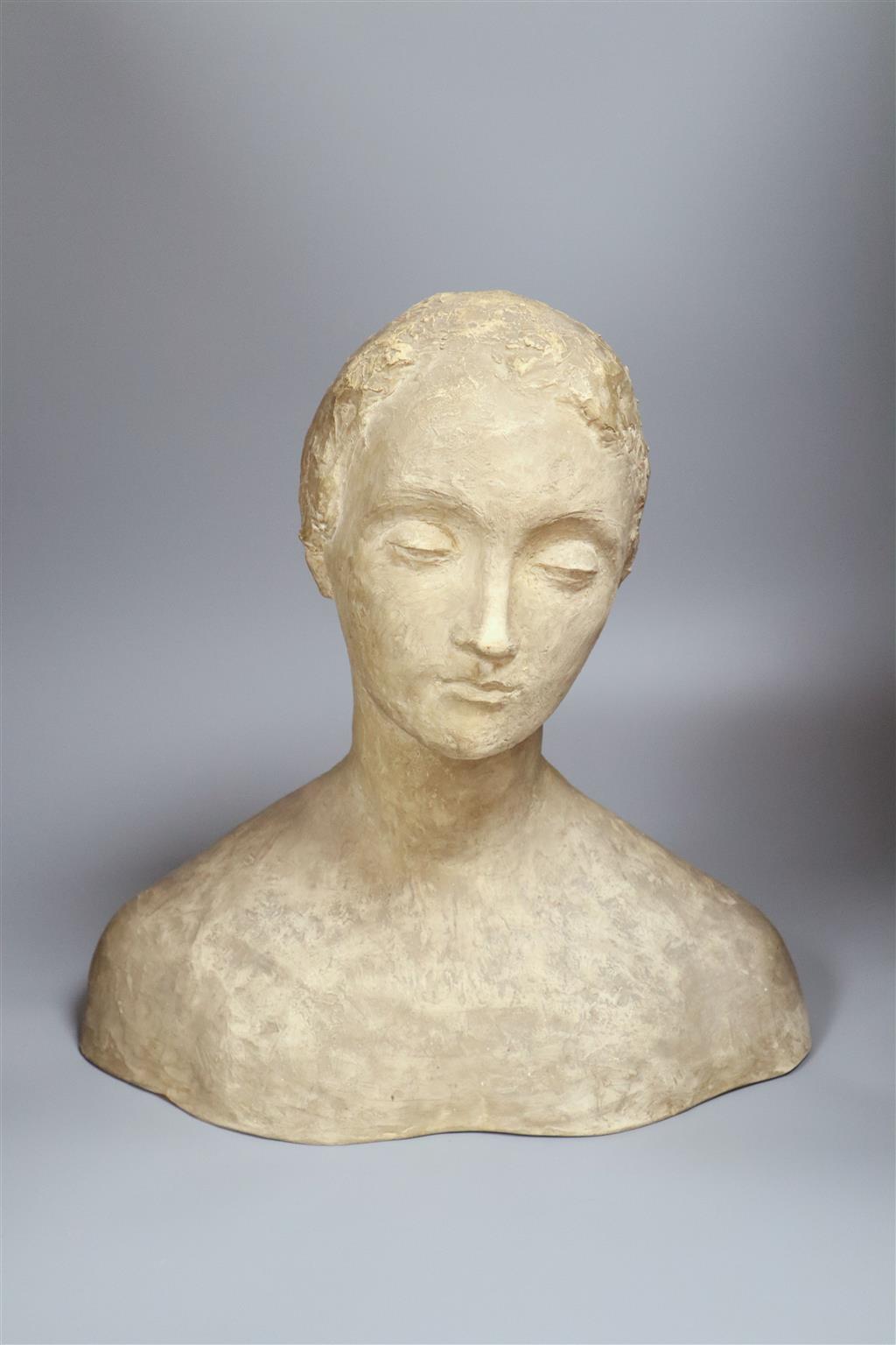 A plaster bust of a woman, height 40cm